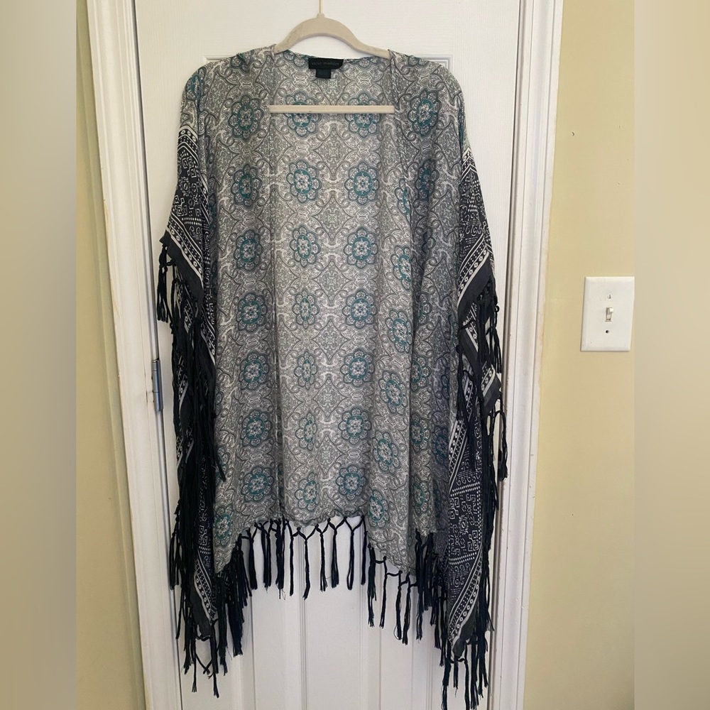 Steve Madden shrug